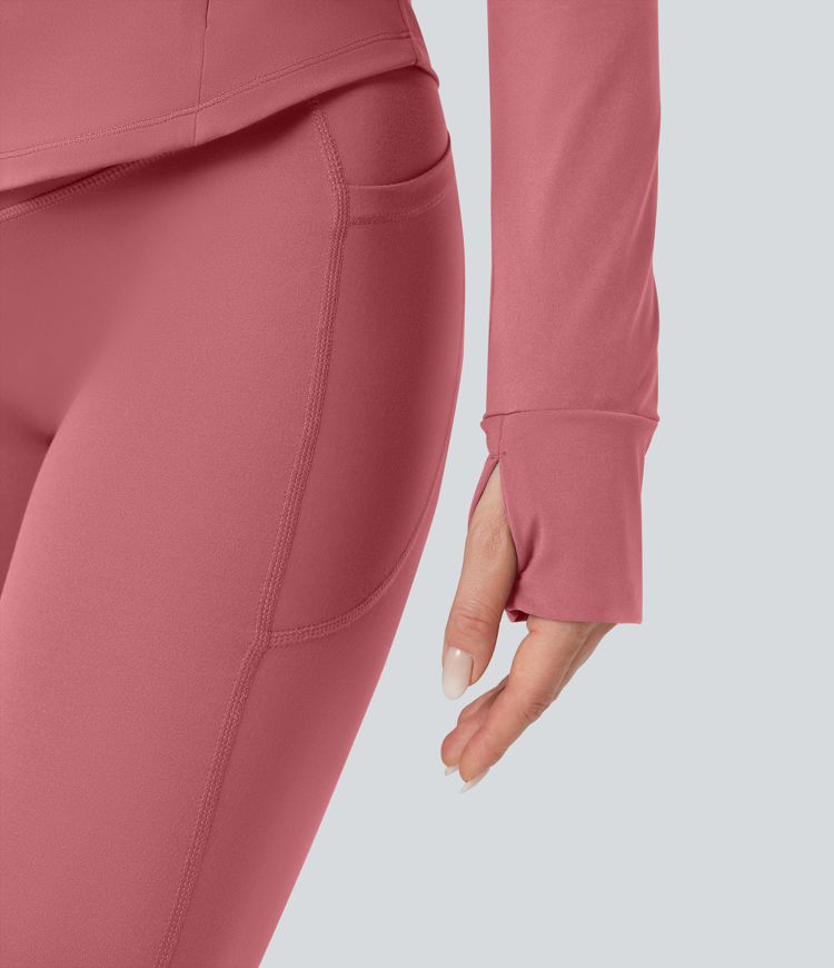 Gilet de yoga Halara UltraSculpt™ à manches longues push-up et taille haute, avec trois poches pour les pouces.