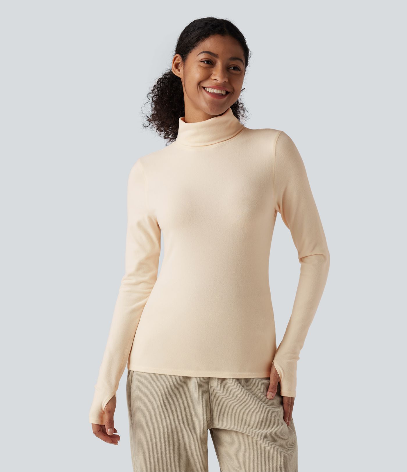 Top réchauffant col roulé manches longues avec trous pouces