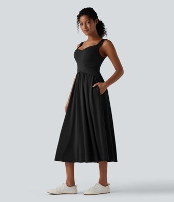 Robe décontractée midi fluide sans manches dos croisé ouvert avec poches