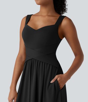 Robe décontractée midi fluide sans manches dos croisé ouvert avec poches