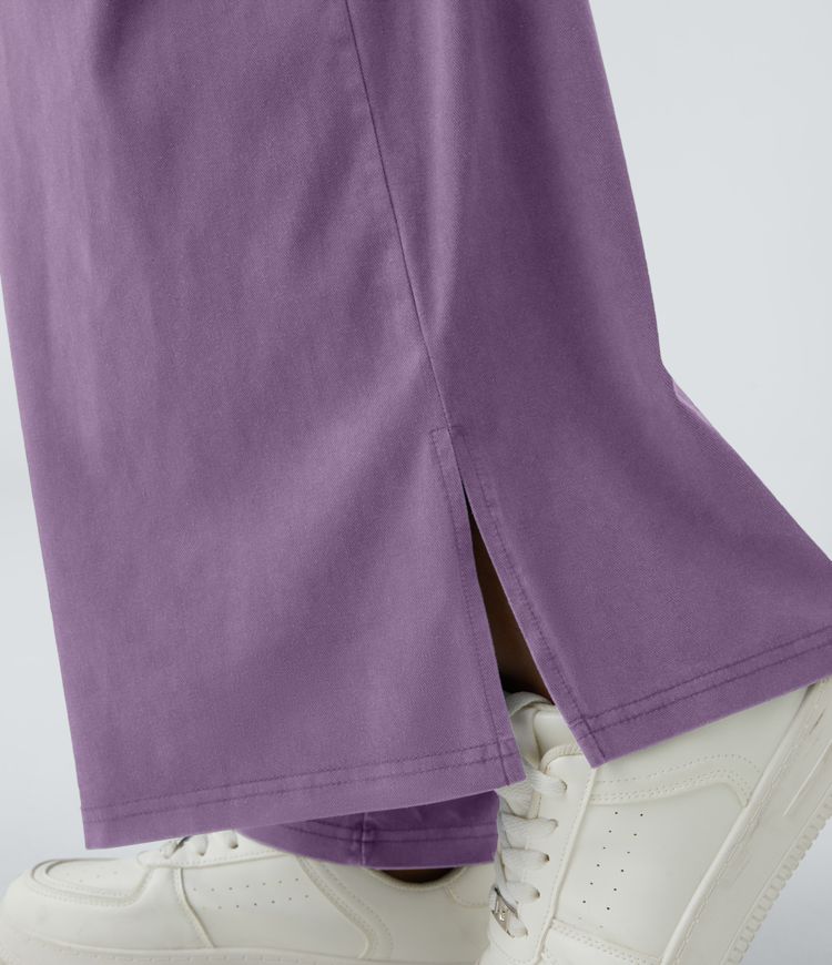 Pantalón ancho tiro alto plisado bolsillo lateral dobladillo dividido cremallera botón