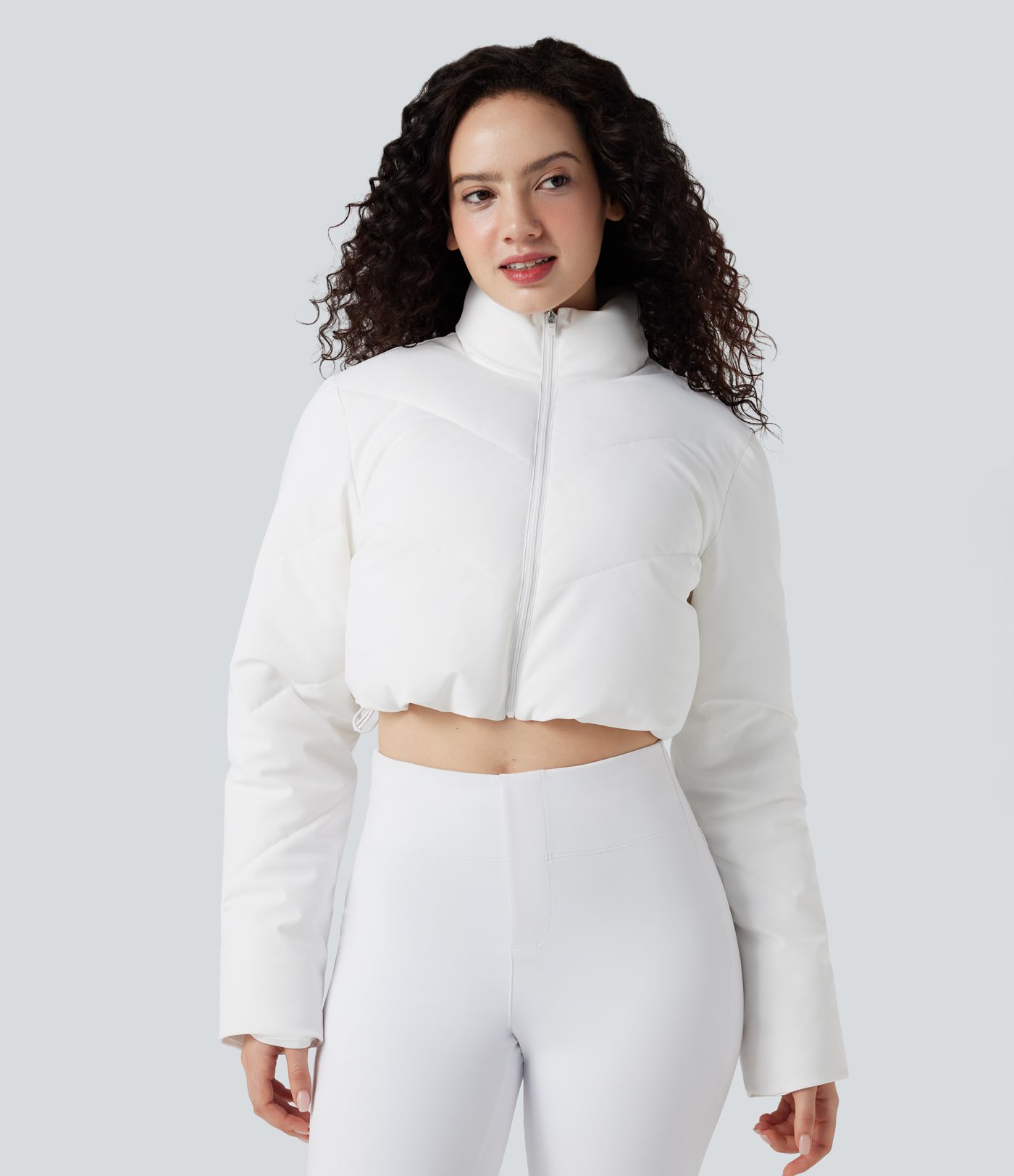 Lässige, kurze 3-in-1 Stretch-Pufferjacke mit Stehkragen, Seitentaschen, langen Ärmeln, Daumenlöchern und geschwungenem Saum