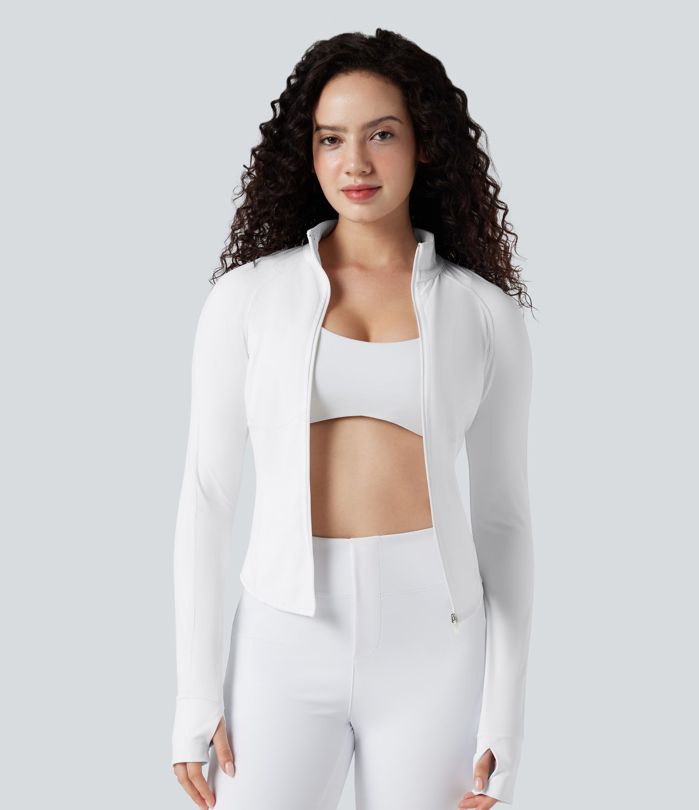 Lässige, kurze 3-in-1 Stretch-Pufferjacke mit Stehkragen, Seitentaschen, langen Ärmeln, Daumenlöchern und geschwungenem Saum