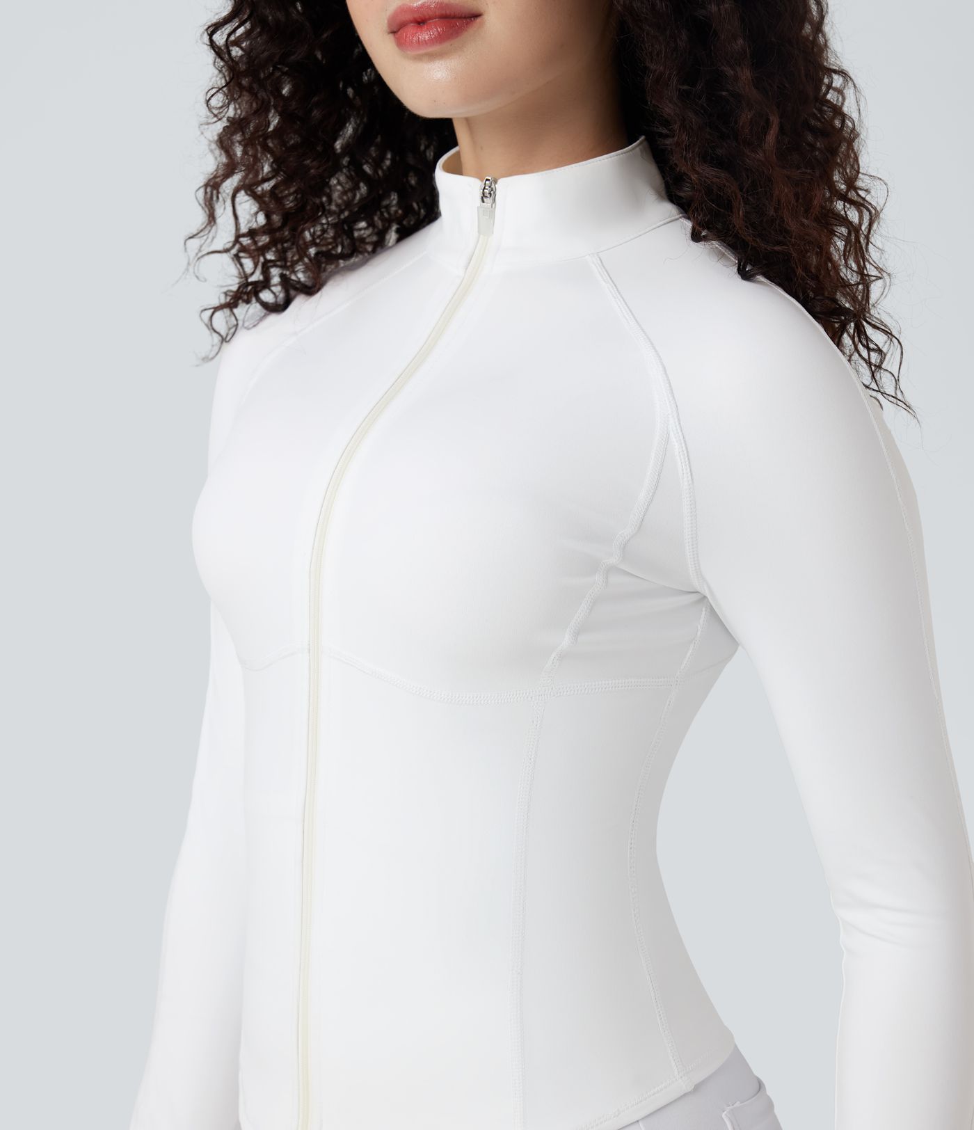 Lässige, kurze 3-in-1 Stretch-Pufferjacke mit Stehkragen, Seitentaschen, langen Ärmeln, Daumenlöchern und geschwungenem Saum