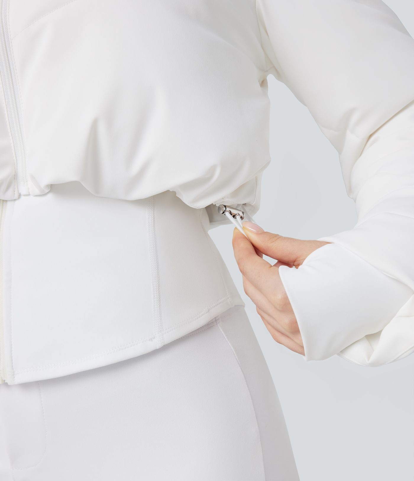 Lässige, kurze 3-in-1 Stretch-Pufferjacke mit Stehkragen, Seitentaschen, langen Ärmeln, Daumenlöchern und geschwungenem Saum