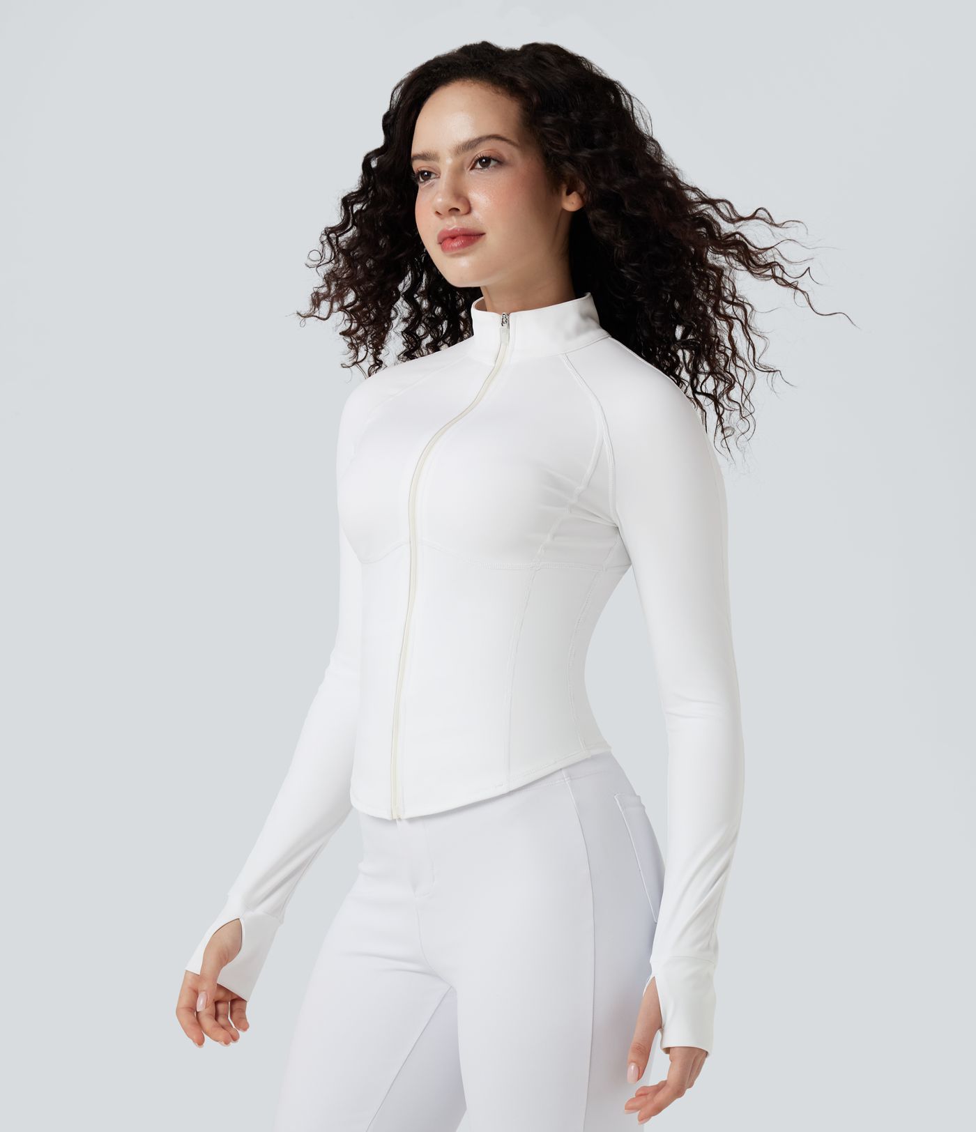 Lässige, kurze 3-in-1 Stretch-Pufferjacke mit Stehkragen, Seitentaschen, langen Ärmeln, Daumenlöchern und geschwungenem Saum