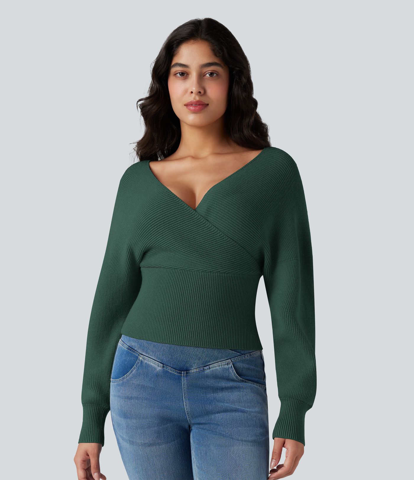 Pull col V manches chauve-souris longues à découpes