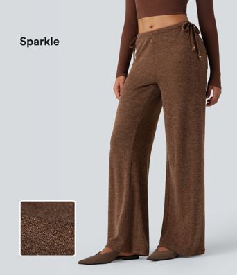 Priložnostne hlače iz rebraste pletenine z metalnim učinkom, s srednjim pasom, z zavezovalno vrvico, širokimi hlačnicami in žepi