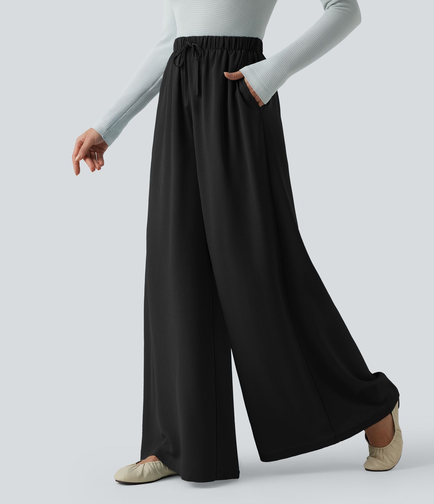 Lässige, fließende Baggy-Hose in Leinenoptik mit hohem Bund, Seitentaschen und Kordelzug