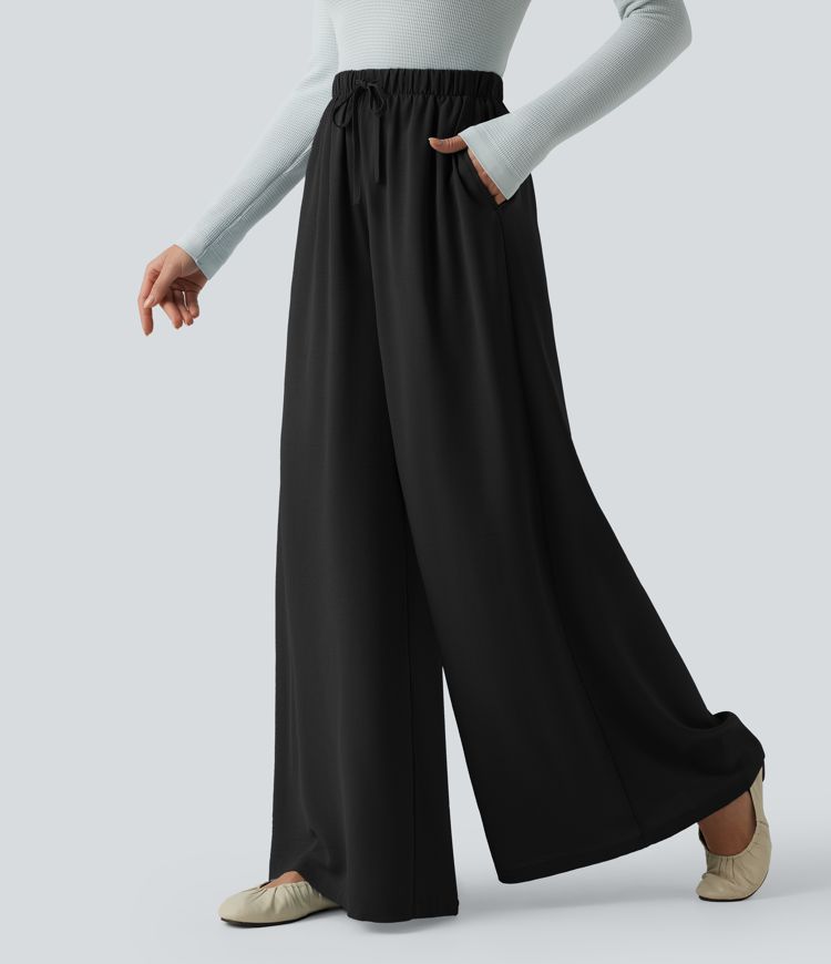 Lässige, fließende Baggy-Hose in Leinenoptik mit hohem Bund, Seitentaschen und Kordelzug