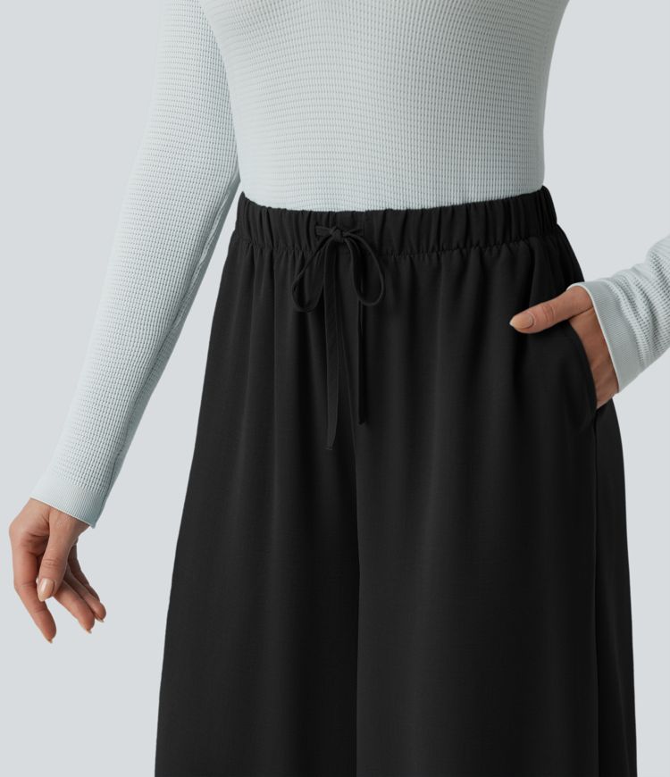 Lässige, fließende Baggy-Hose in Leinenoptik mit hohem Bund, Seitentaschen und Kordelzug