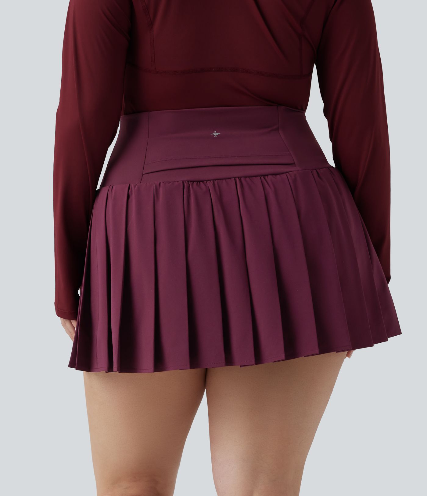 Tallas grandes Breezeful™: falda mini de yoga 2 en 1 plisada, de cintura alta, con dobladillo asimétrico, de secado rápido y con bolsillos