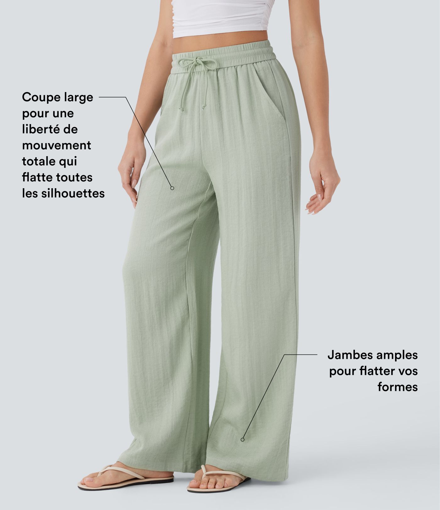 Pantalon large fluide taille haute avec cordon de serrage, poches latérales et aspect lin
