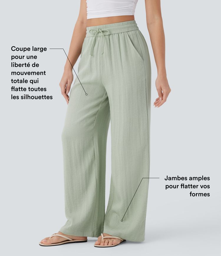 Pantalon large fluide taille haute avec cordon de serrage, poches latérales et aspect lin