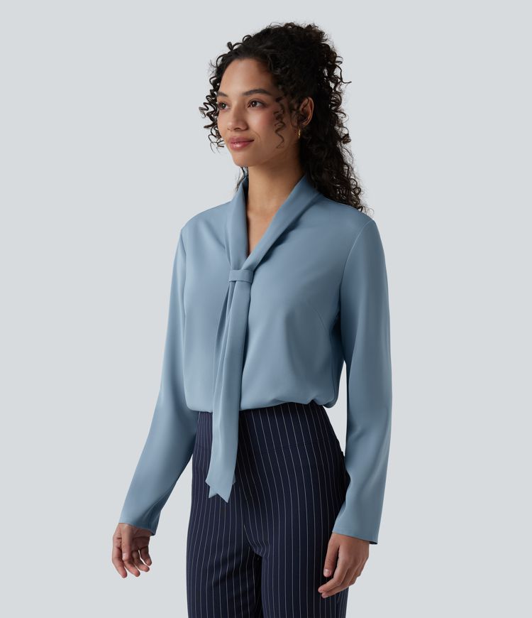 Blouse tailleur ample infroissable à col V, manches longues et nœud