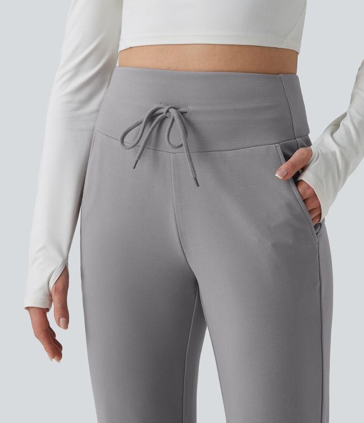 Lässige Flare-Hose mit hohem Bund, Seitentaschen, Bauchkontrolle, Kordelzug und Waffelstruktur