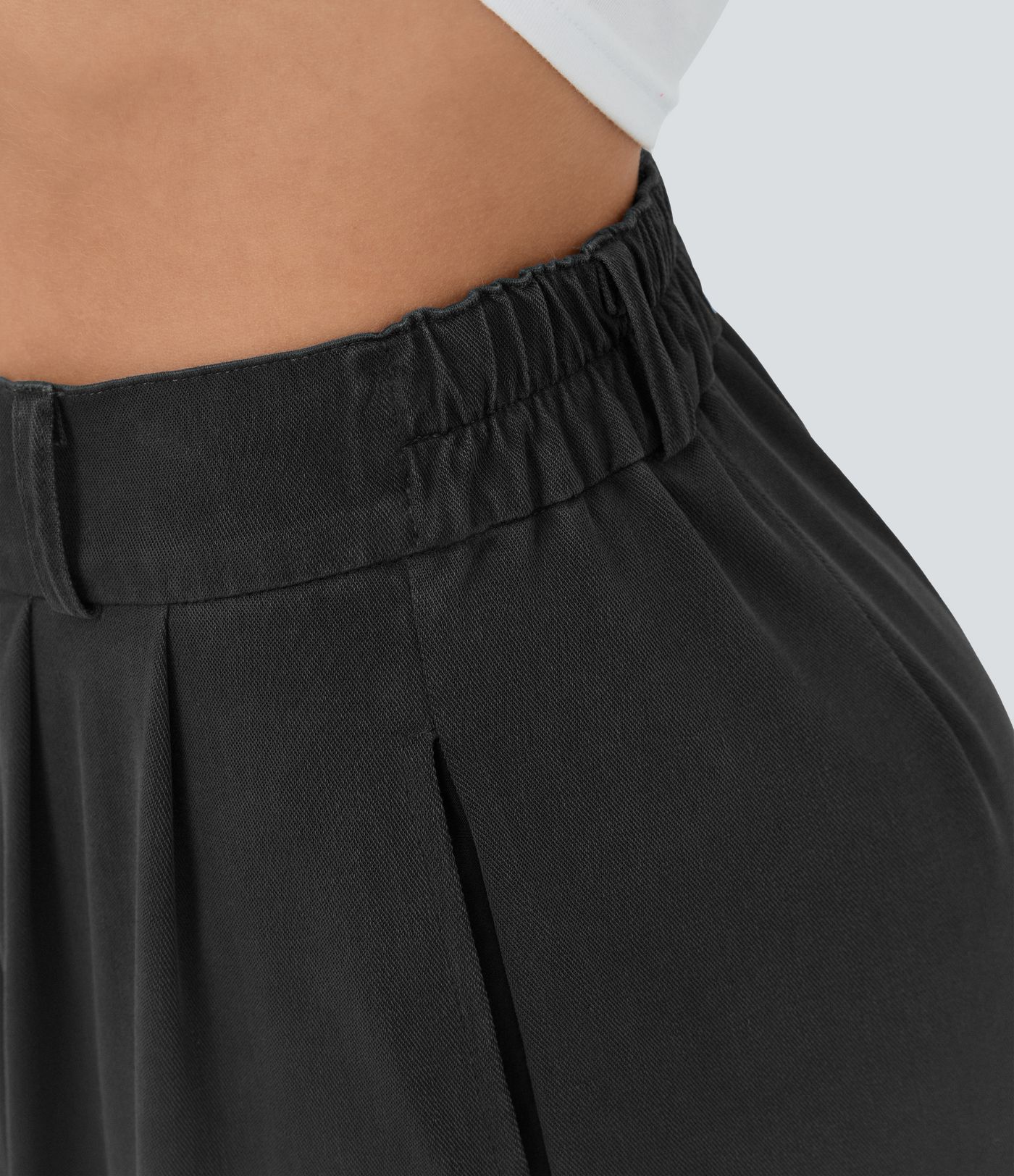 Pantalón ancho tiro alto plisado bolsillo lateral dobladillo dividido cremallera botón