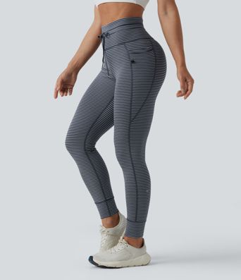 Striped yoga leggings with a high waist, side pockets and drawstring