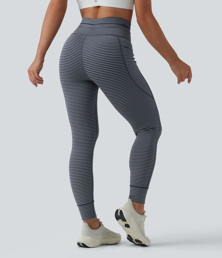 Striped yoga leggings with a high waist, side pockets and drawstring