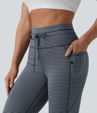 Striped yoga leggings with a high waist, side pockets and drawstring