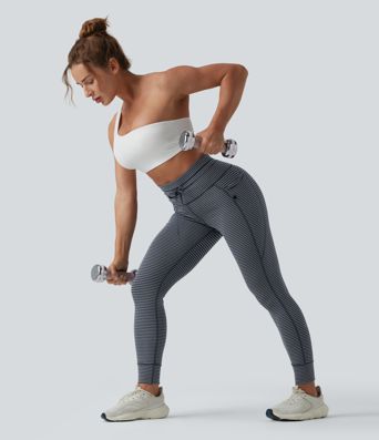 Striped yoga leggings with a high waist, side pockets and drawstring