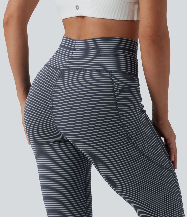 Striped yoga leggings with a high waist, side pockets and drawstring