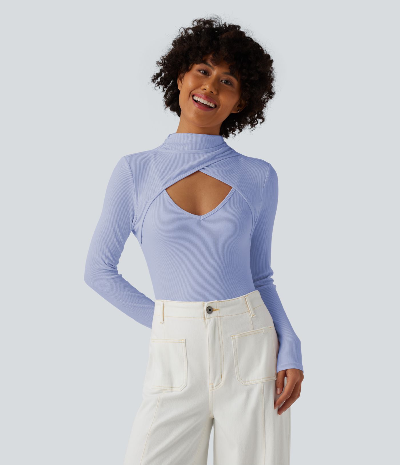 Figure-hugging ribbed knit work bodysuit with high slit, long sleeves and neckline
