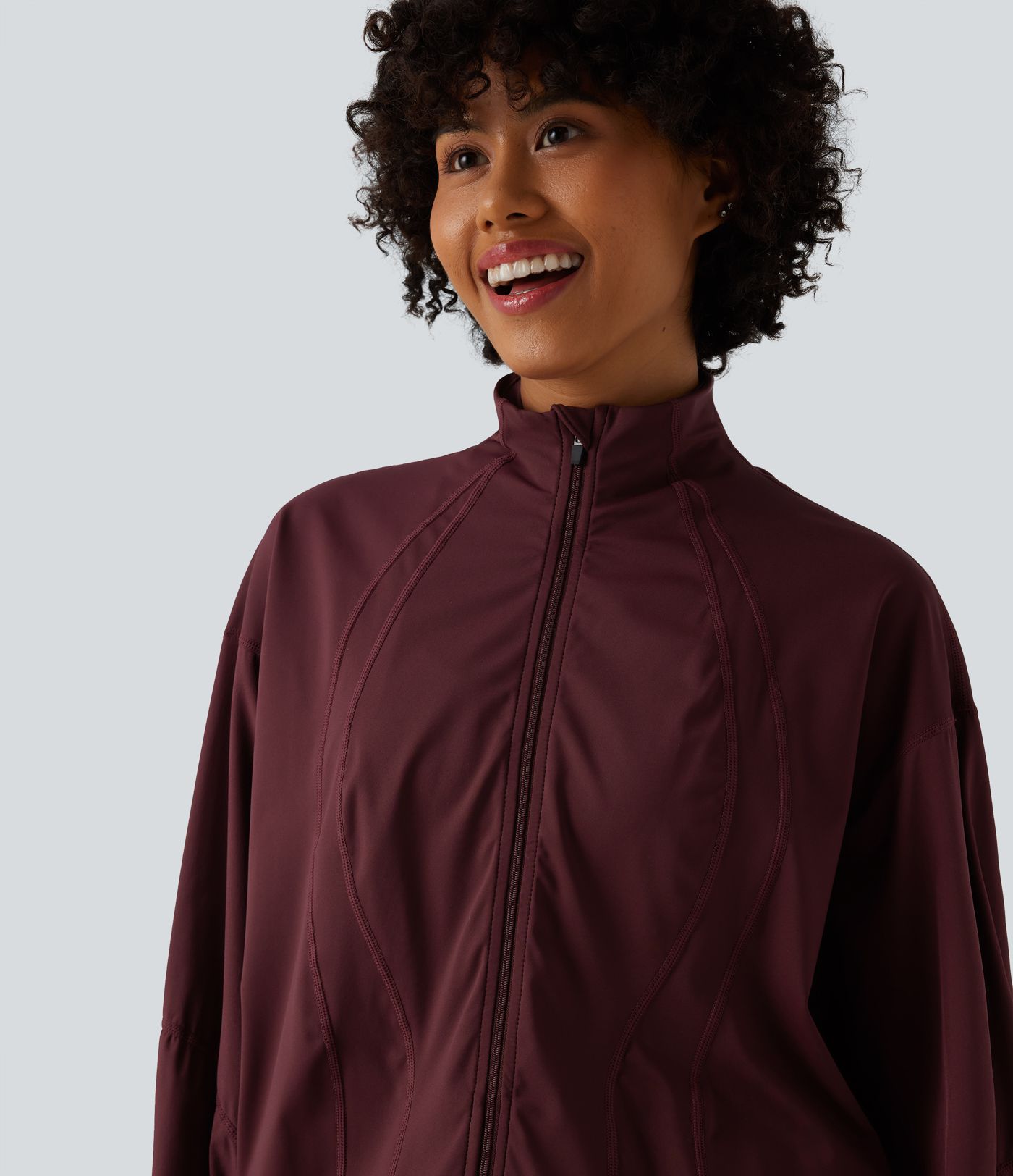 Veste d'entraînement oversize col montant avec passage de pouce, ourlet à cordon de serrage et poches