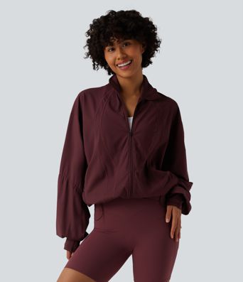 Veste d'entraînement oversize col montant avec passage de pouce, ourlet à cordon de serrage et poches