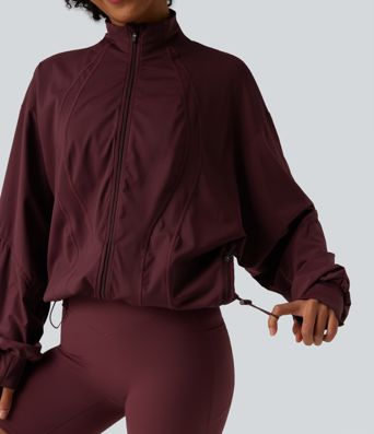 Veste d'entraînement oversize col montant avec passage de pouce, ourlet à cordon de serrage et poches