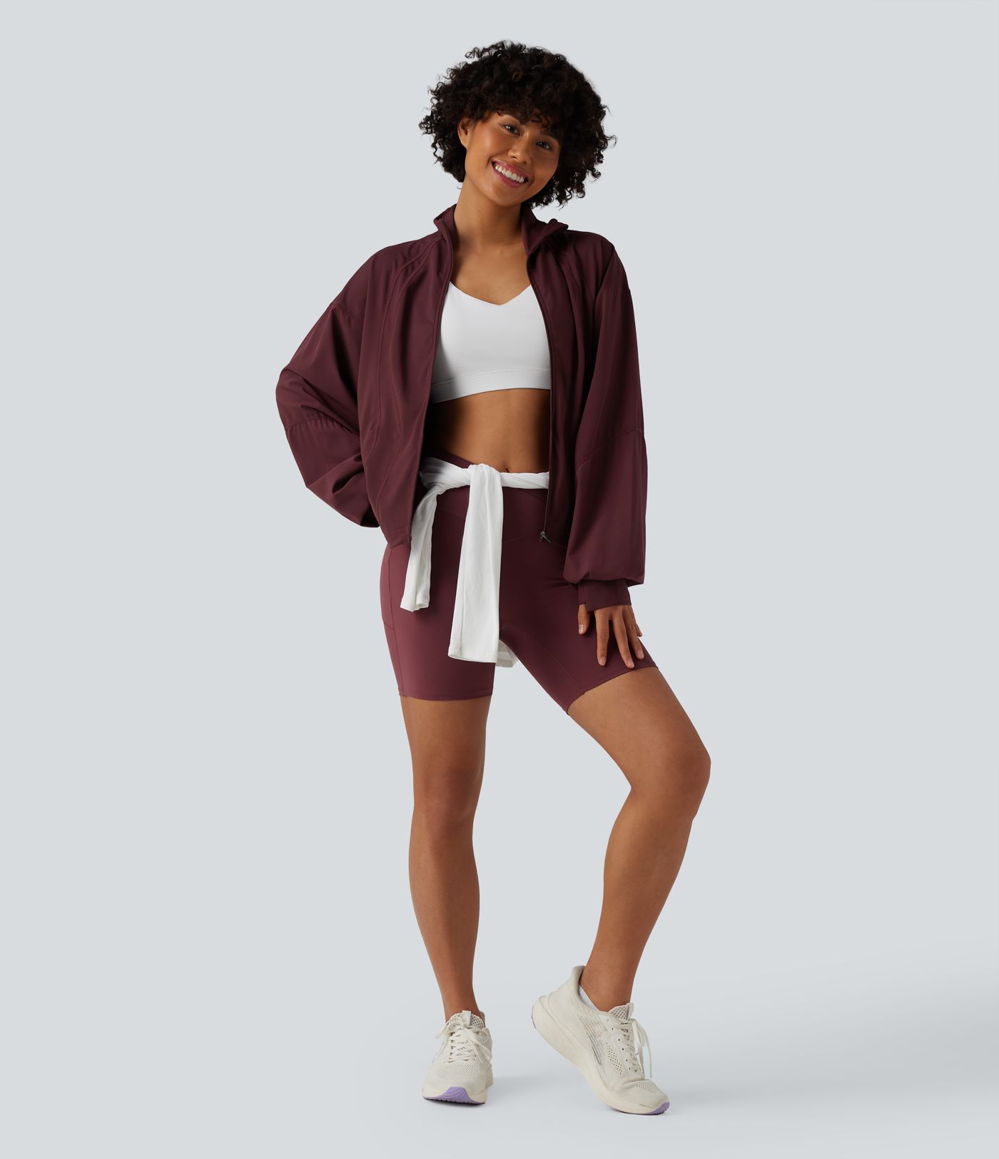 Veste d'entraînement oversize col montant avec passage de pouce, ourlet à cordon de serrage et poches