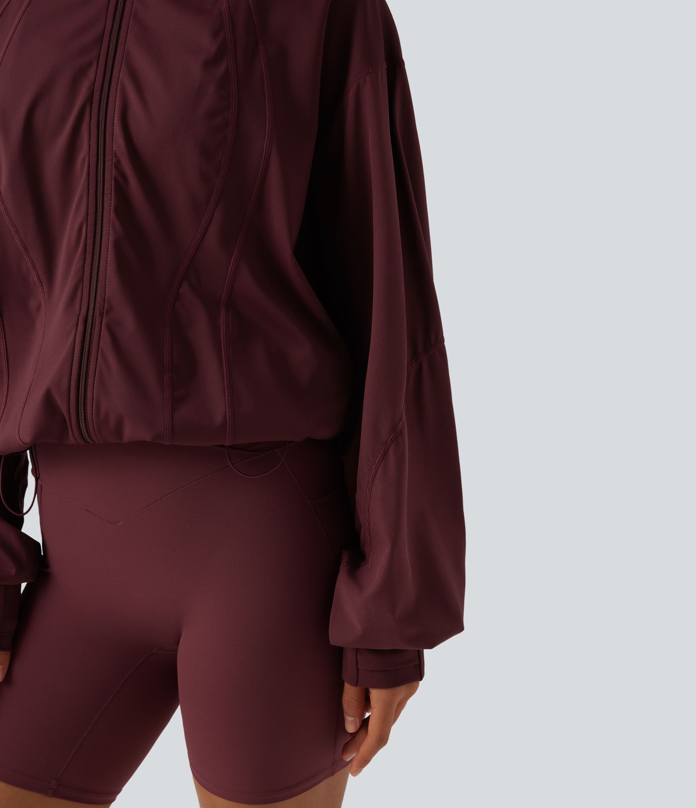 Veste d'entraînement oversize col montant avec passage de pouce, ourlet à cordon de serrage et poches