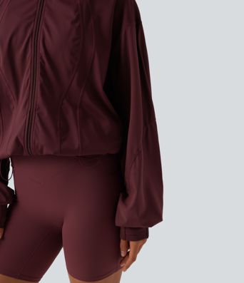 Veste d'entraînement oversize col montant avec passage de pouce, ourlet à cordon de serrage et poches