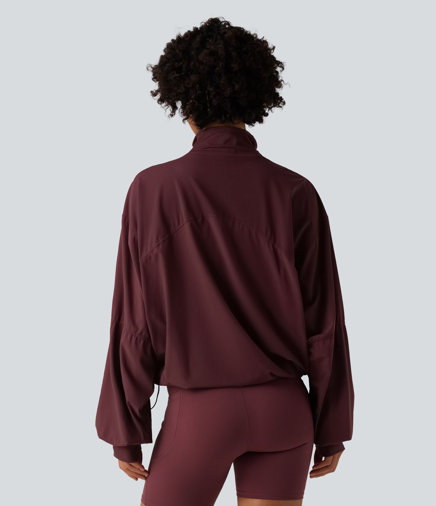 Veste d'entraînement oversize col montant avec passage de pouce, ourlet à cordon de serrage et poches