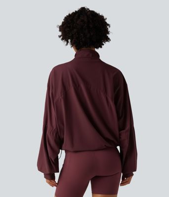 Veste d'entraînement oversize col montant avec passage de pouce, ourlet à cordon de serrage et poches