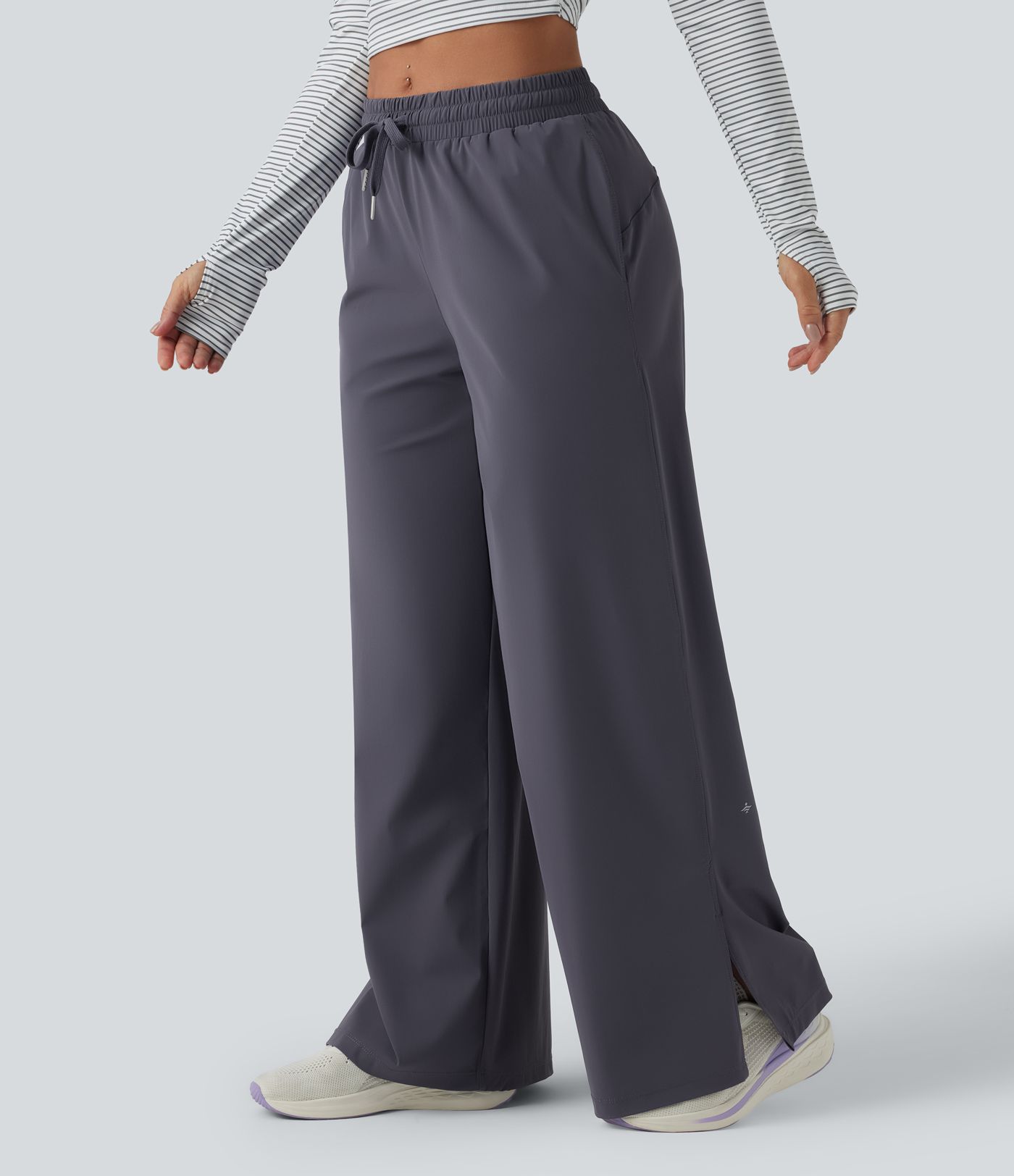 Keskmise vöökohaga jooksupüksid nööriga, sirge säärega, kiiresti kuivavad ja taskutega