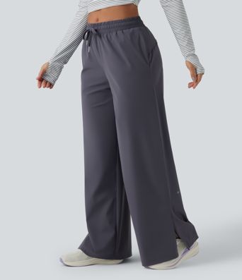 Keskmise vöökohaga jooksupüksid nööriga, sirge säärega, kiiresti kuivavad ja taskutega