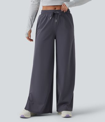 Keskmise vöökohaga jooksupüksid nööriga, sirge säärega, kiiresti kuivavad ja taskutega