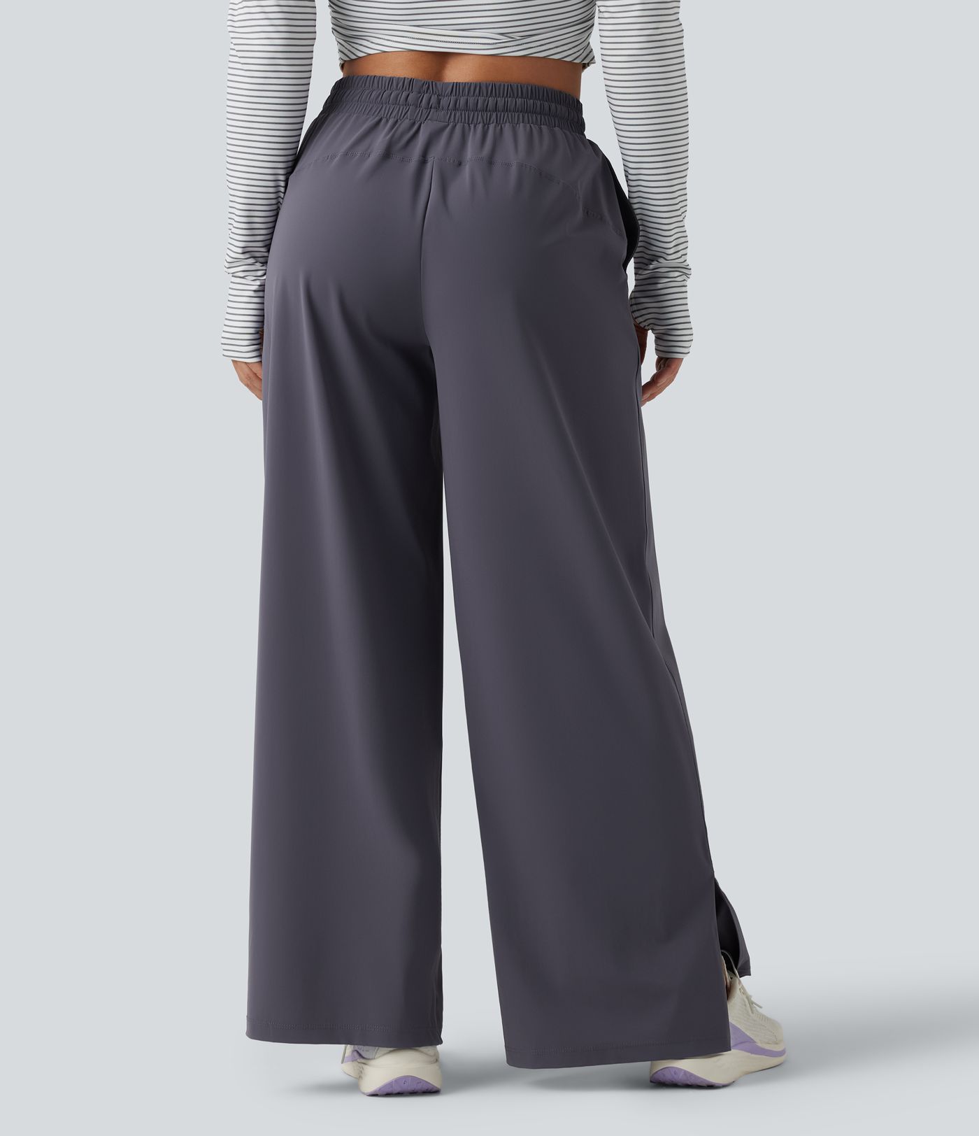 Keskmise vöökohaga jooksupüksid nööriga, sirge säärega, kiiresti kuivavad ja taskutega