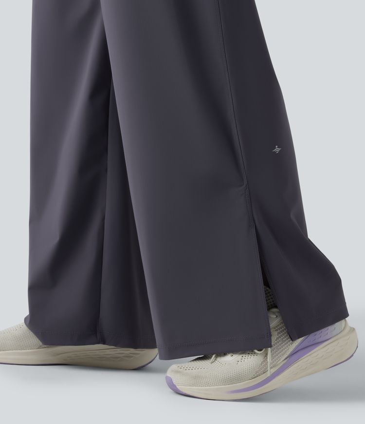 Keskmise vöökohaga jooksupüksid nööriga, sirge säärega, kiiresti kuivavad ja taskutega