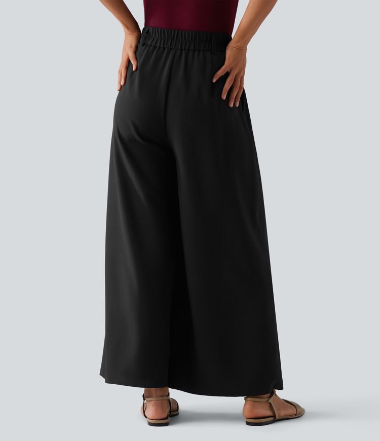 Pantalon tailleur 7/8 large plissé taille haute aspect lin avec poches