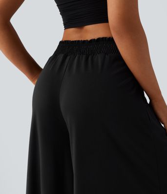 Pantalon fluide taille haute smocké avec poches