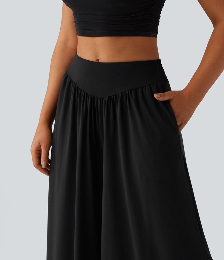 Pantalon fluide taille haute smocké avec poches