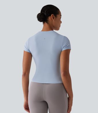 Top deportivo de punto acanalado con cuello redondo y mangas cortas