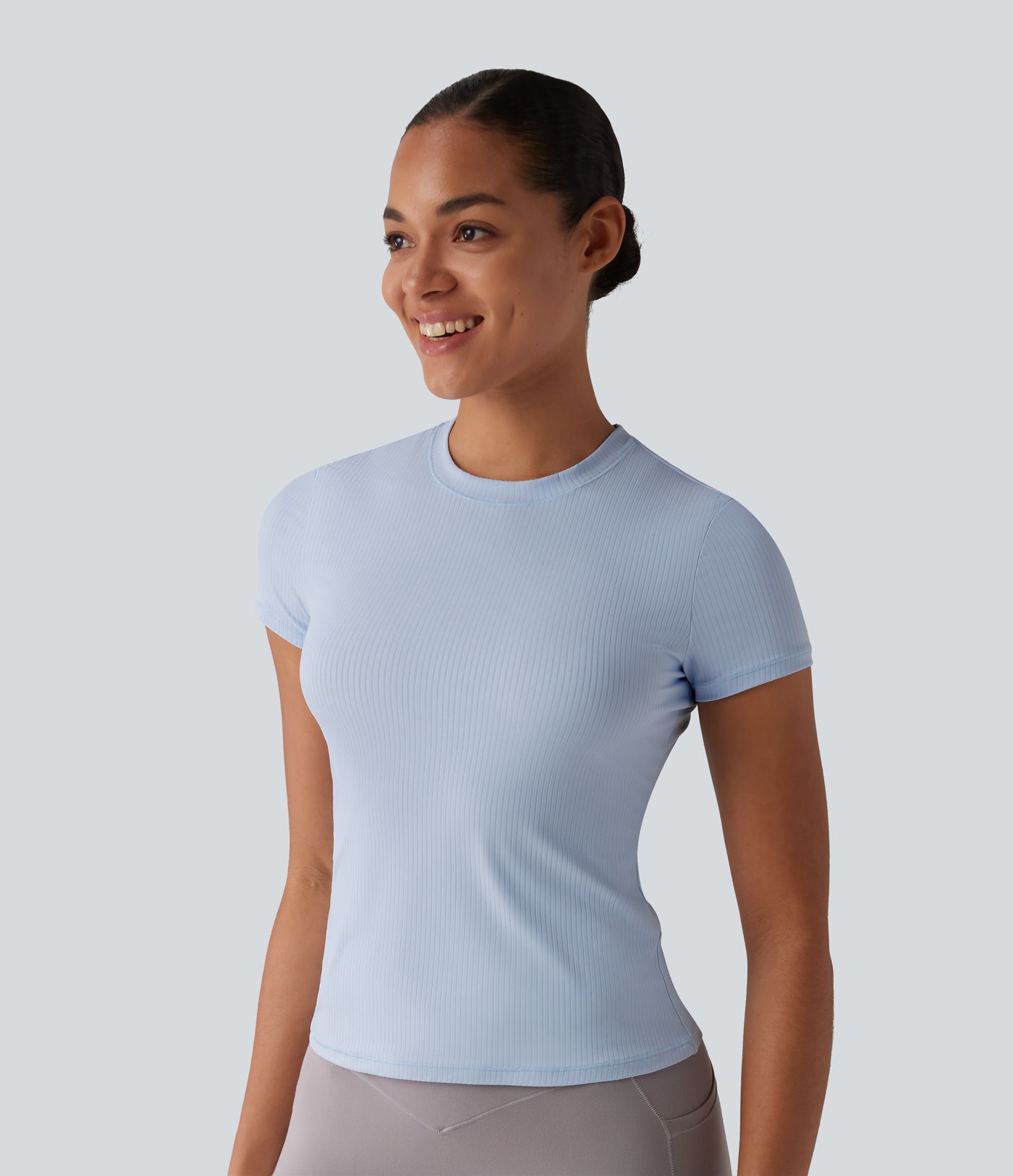 Top deportivo de punto acanalado con cuello redondo y mangas cortas