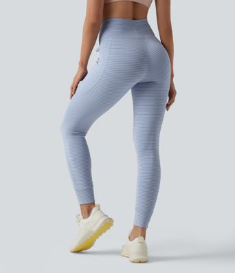 Leggings de yoga de cintura alta con rayas y bolsillos