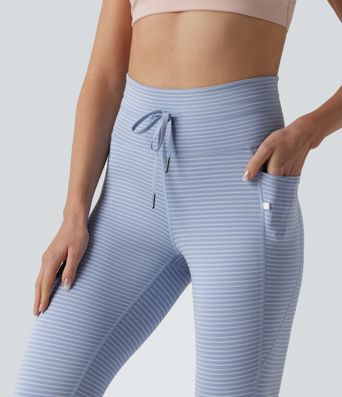Leggings de yoga de cintura alta con rayas y bolsillos