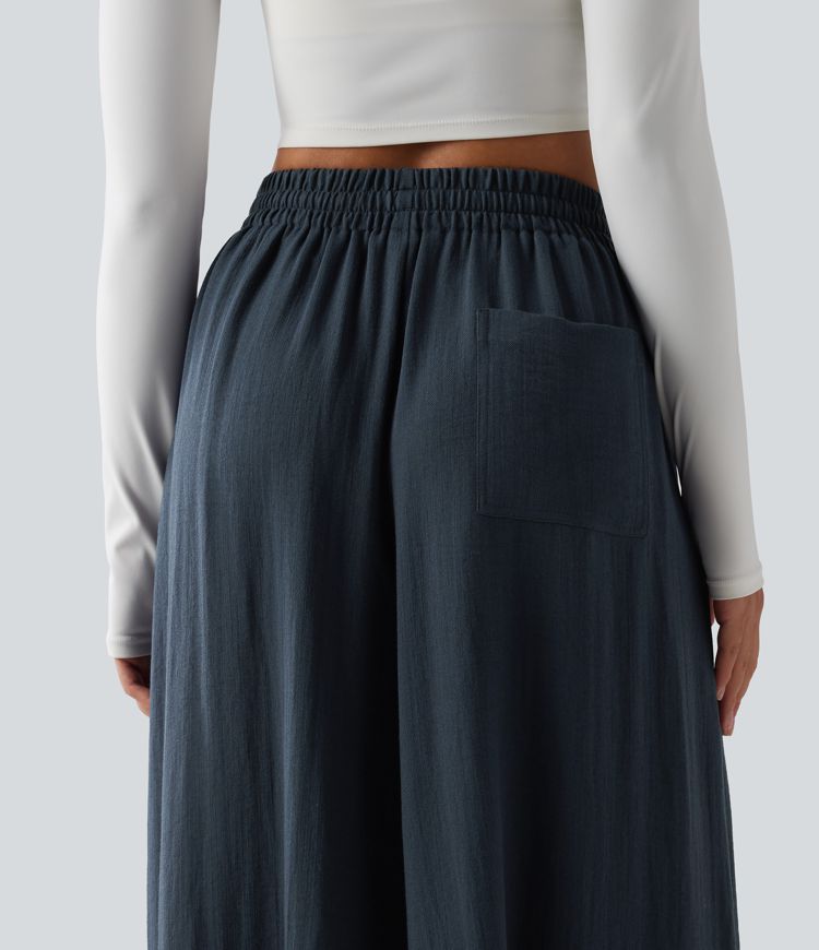 Lässige, fließende Hose mit hohem Bund, mehreren Taschen, Kordelzug und weitem Bein