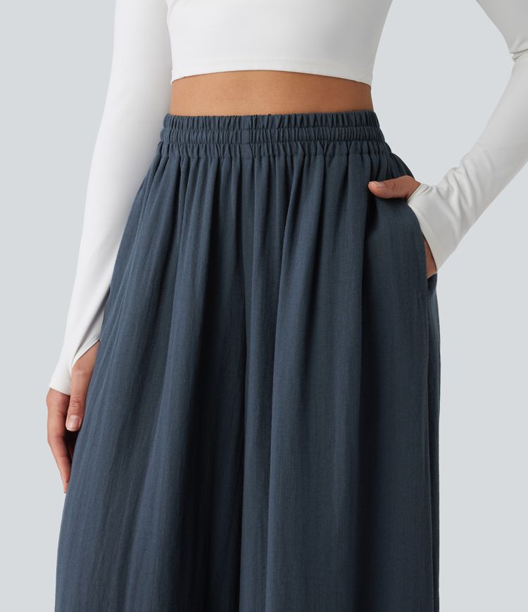 Lässige, fließende Hose mit hohem Bund, mehreren Taschen, Kordelzug und weitem Bein