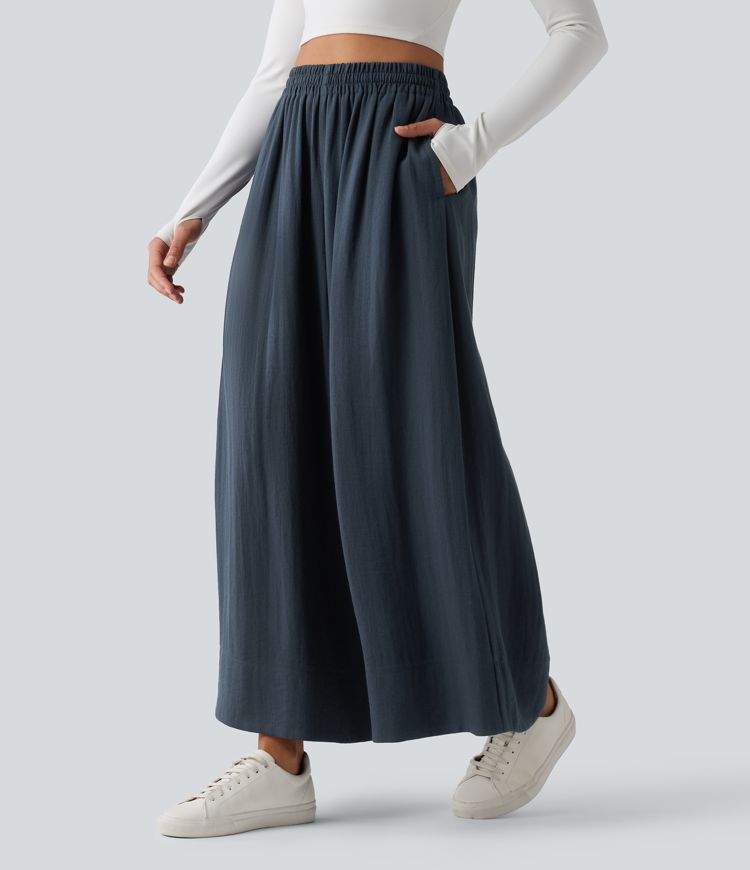 Lässige, fließende Hose mit hohem Bund, mehreren Taschen, Kordelzug und weitem Bein